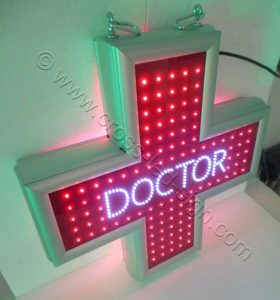 Κόκκινος σταυρός ιατρείου με logo DOCTOR στο κέντρο της οθόνης.