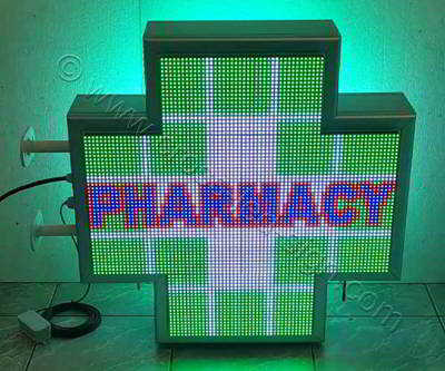 Σταυρός φαρμακείου LED RGB 70 cm με εφέ πράσινα τετράγωνα περιμετρικά και την λέξη PHRMACY στο κέντρο.