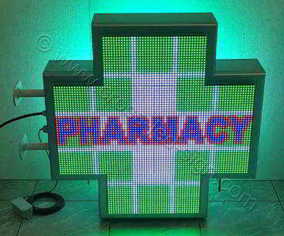 Σταυρός φαρμακείου LED RGB 70 cm με εφέ πράσινα τετράγωνα περιμετρικά και την λέξη PHRMACY στο κέντρο. Σταυρός φαρμακείου LED RGB 70 cm με εφέ πράσινα τετράγωνα περιμετρικά και την λέξη PHRMACY στο κέντρο.