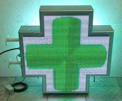 Σταυρός φαρμακείου LED RGB 70 cm με εφέ 3d πράσινο κινούμενο σταυρό περί τον άξονα του και λευκό φόντο. Σταυρός φαρμακείου LED RGB 70 cm με εφέ 3d πράσινο κινούμενο σταυρό περί τον άξονα του και λευκό φόντο.