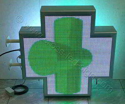 Σταυρός φαρμακείου LED RGB 70 cm με εφέ 3d πράσινο κινούμενο κυλινδρικό σταυρό περί τον άξονα του και λευκό φόντο. Σταυρός φαρμακείου LED RGB 70 cm με εφέ 3d πράσινο κινούμενο κυλινδρικό σταυρό περί τον άξονα του και λευκό φόντο.
