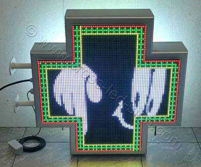 Σταυρός φαρμακείου LED RGB 70 cm με εφέ πολύχρωμο κινούμενο σταυρό περιμετρικά και cartoon στο κέντρο. Σταυρός φαρμακείου LED RGB 70 cm με εφέ πολύχρωμο κινούμενο σταυρό περιμετρικά και cartoon στο κέντρο.