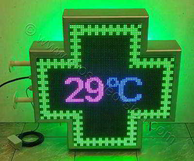 Σταυρός φαρμακείου LED RGB 70 cm με εφέ πράσινο σταυρό, με πολύχρωμα γράμματα στην ένδειξη θερμοκρασίας.