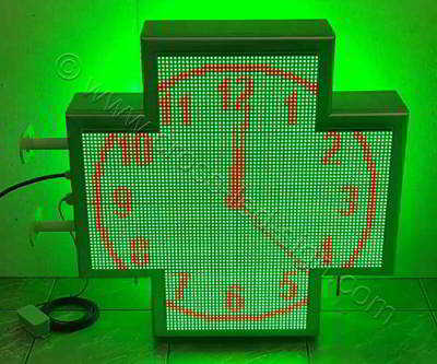 Σταυρός φαρμακείου LED RGB 70 cm με εφέ πράσινο φόντο και κόκκινο αναλογικό ρολόι.